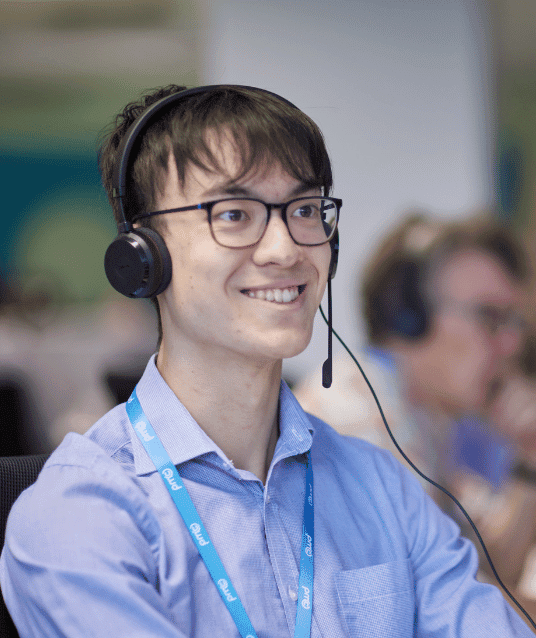 PMC employee with headphone