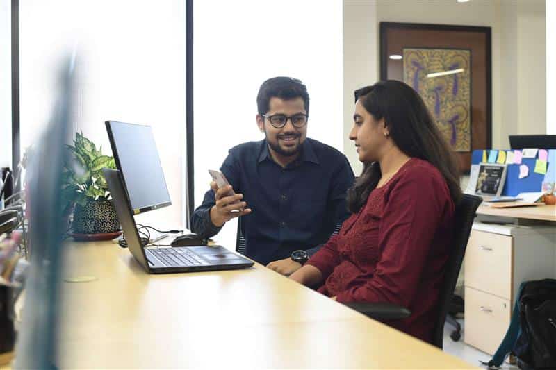 PMC employee testing software on different devices