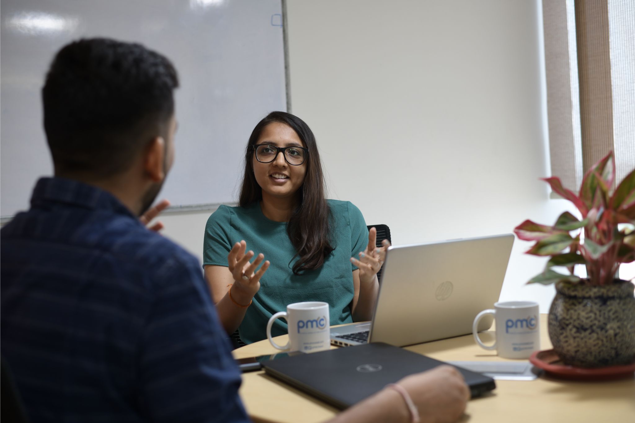 PMC employee in a meeting